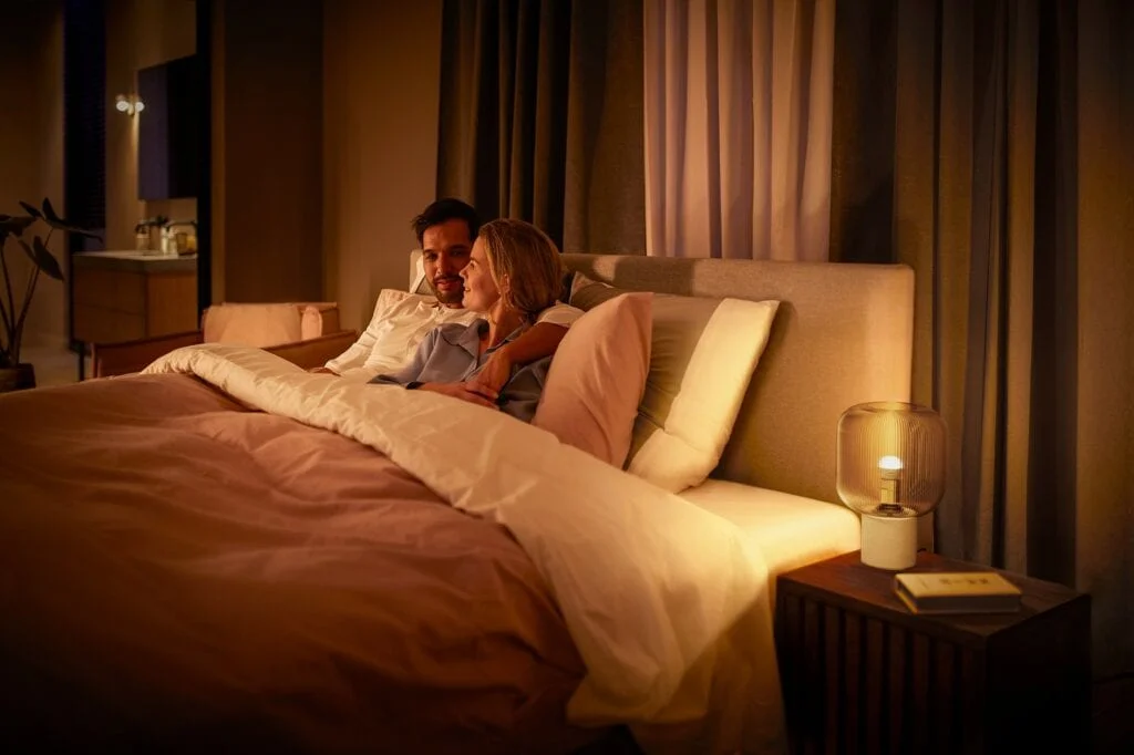 Philips Hue E14 luster bulb in white ambiance lifestyle - Philips Hue Adds ten time slots to motion sensors + brightness balancer for entertainment areas & new E14 Luster bulb, and panels
