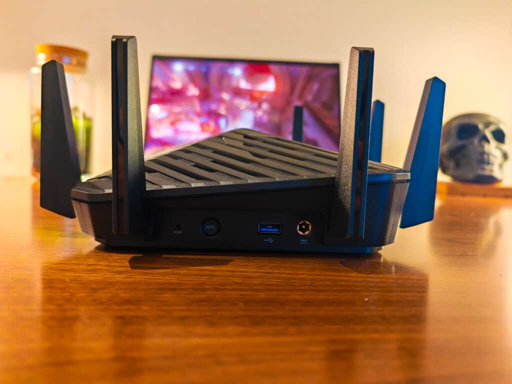 Acer Predator Connect W6 Wi Fi 6E Router Review Side WPS USB and power - Acer Predator Connect W6 Wi-Fi 6E Router Review