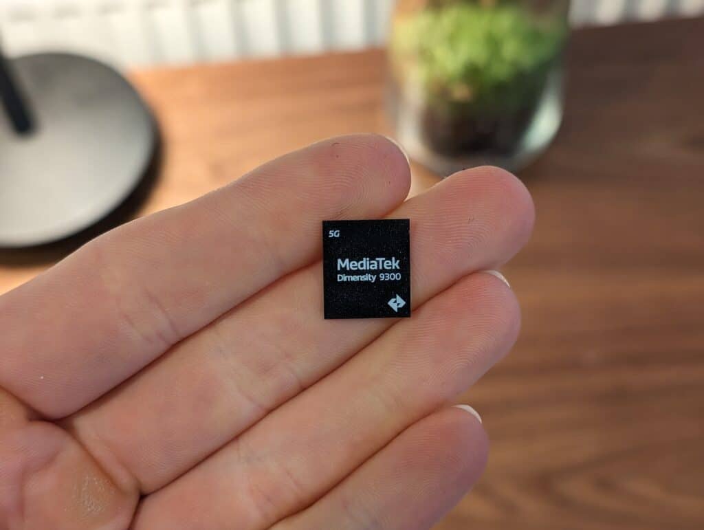 MediaTek Dimensity 9300 in hand - MediaTek Announces Dimensity 9300 Chipset with Qualcomm Snapdragon 8 Gen 3 Beating Claims