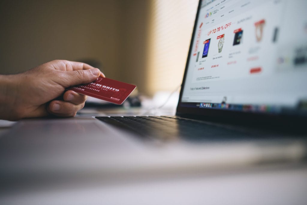 How to make sure your tech spending doesn't get you in debt 2 Canva Online Shopping on Laptop 1024x683 1